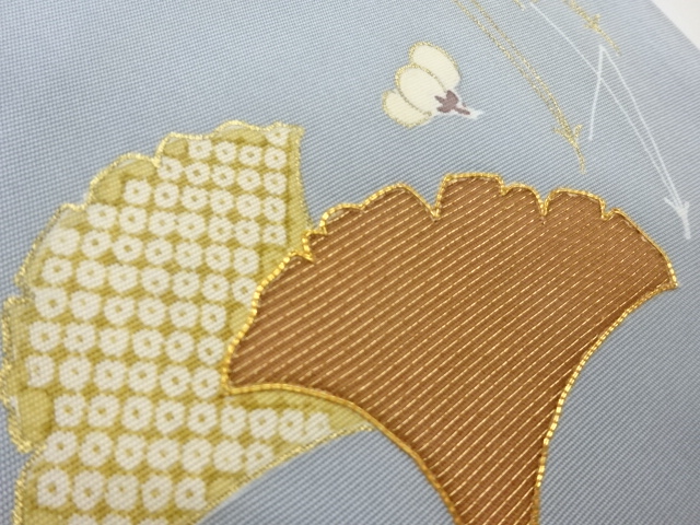 塩瀬金彩金駒刺繍銀杏に松葉・梅模様開き名古屋帯（額縁仕立て
